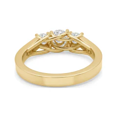 1.01 CTTW Round Three-Stone Ring with Channel Set Accents in 10K Yellow Gold thumbnail 3