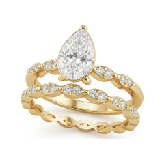 1.06 CTTW Pear Solitaire Engagement Ring & Eternity Band Set in 10K Yellow Gold thumbnail 1