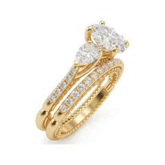 3.02 CTTW Oval & Pear Three-Stone Milgrain Bridal Set in 10K Yellow Gold thumbnail 2